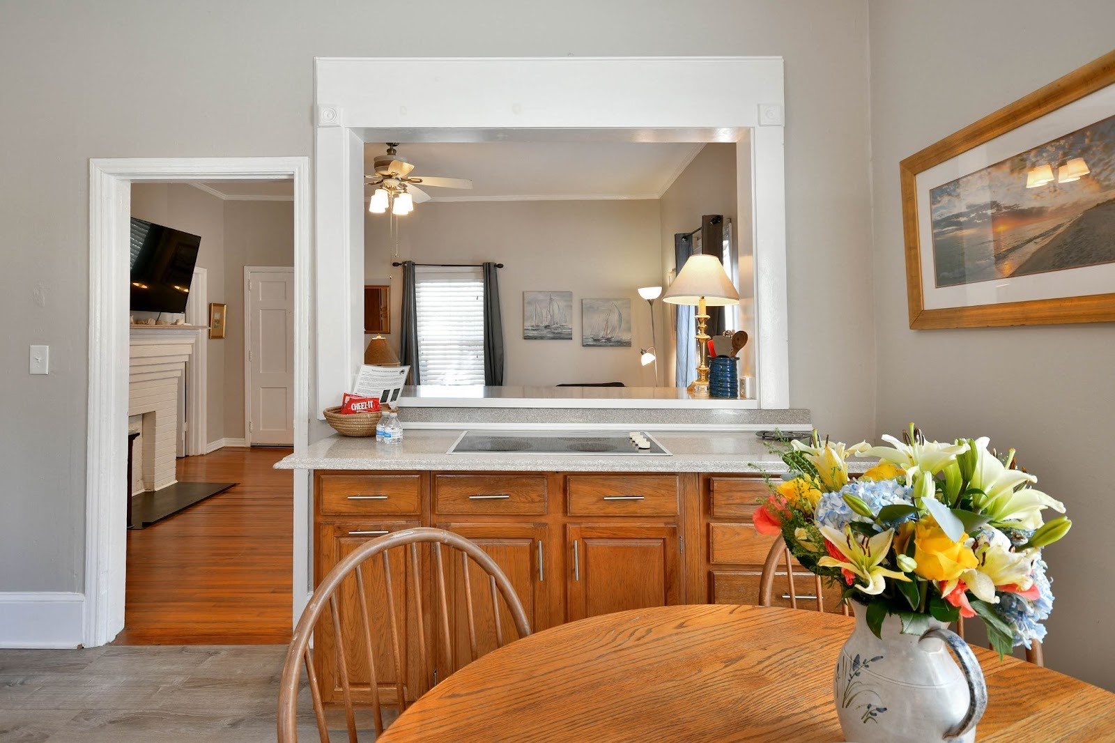 Open kitchen and dining area in a Homes 4 Rent Greenville furnished rental